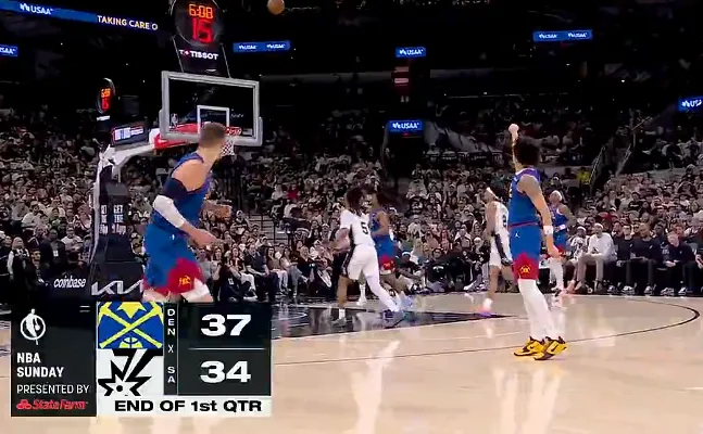 V体育-约基奇打满12分钟拿到12分7篮板，掘金首节37-34领先马刺